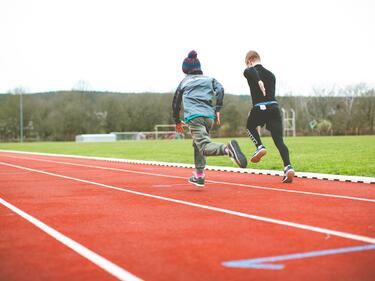 Kids running on the track