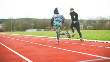 Kids running on the track